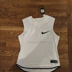 Nike White Sleeveless Athletic Tank with Black Swoosh